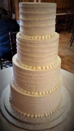 four tier frosted cake