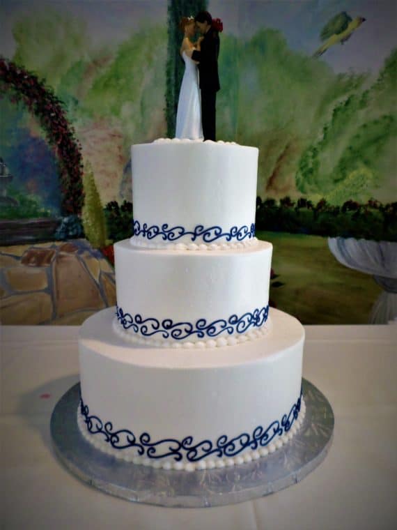 3 tiered blue and white cake